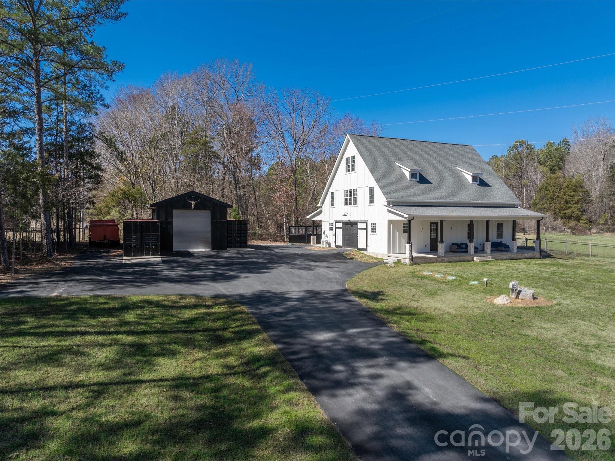 2221 Waxhaw-Marvin Road Waxhaw, NC 28173 - Photo 3 of 30 a front view of a house with a yard