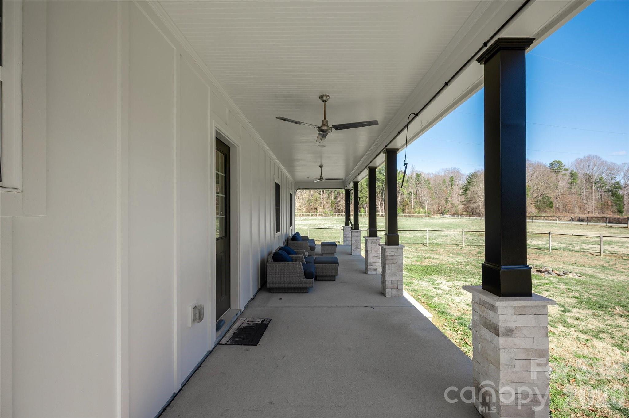 2221 Waxhaw-Marvin Road Waxhaw, NC 28173 - Photo 4 of 30 a living room with furniture and large windows
