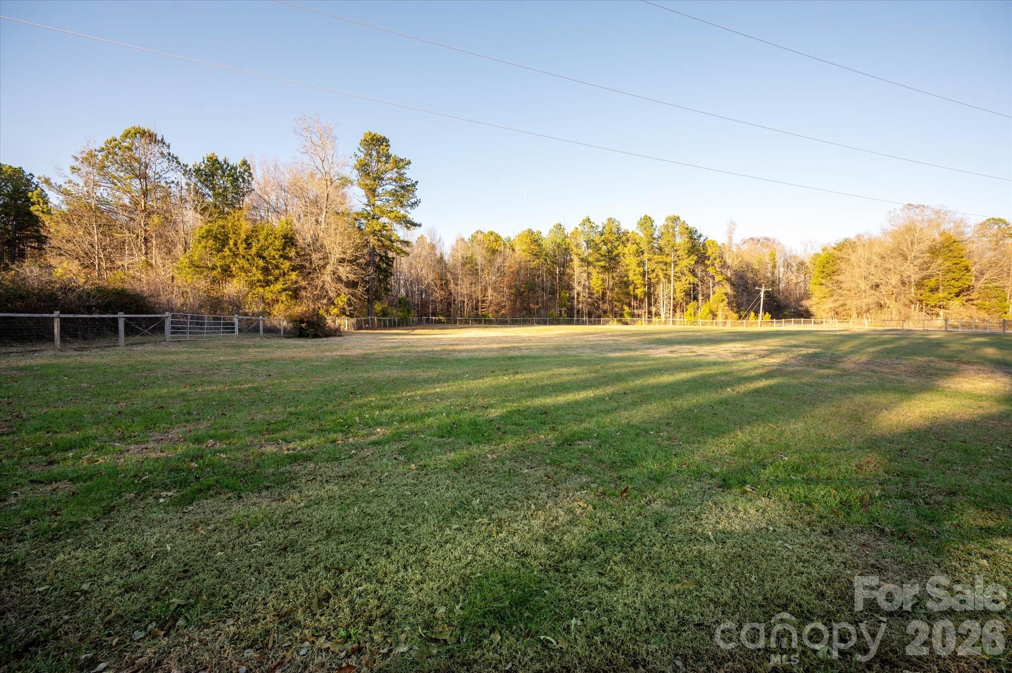 2221 Waxhaw-Marvin Road Waxhaw, NC 28173 - Photo 5 of 30 a view of a green field
