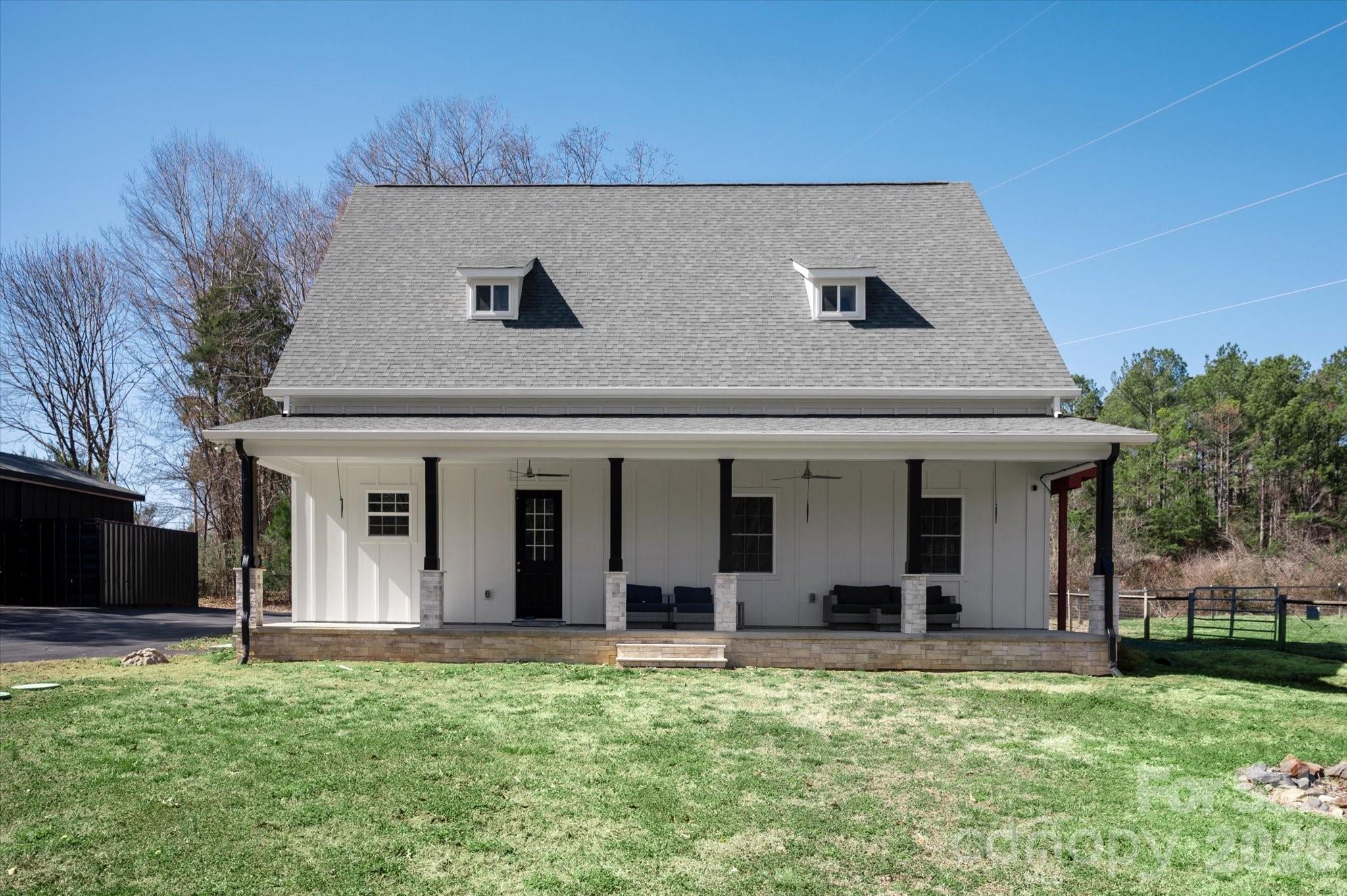 2221 Waxhaw-Marvin Road Waxhaw, NC 28173 - Photo 6 of 30 a view of a house with backyard