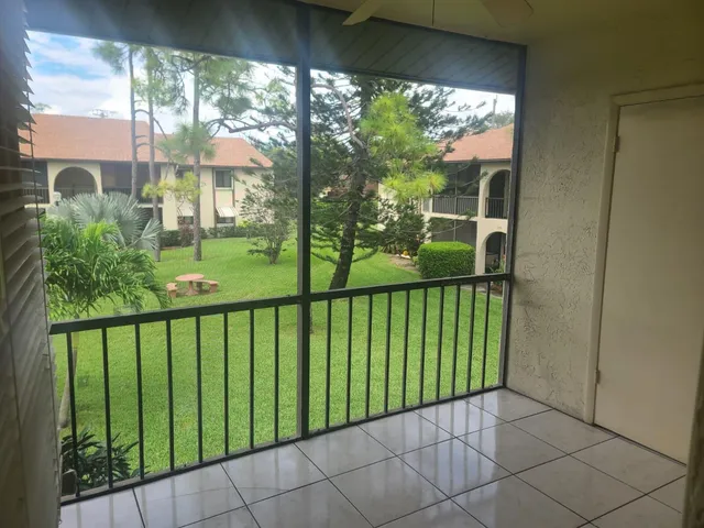 a view of empty room with windows