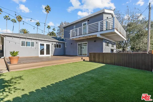 a view of backyard with green space