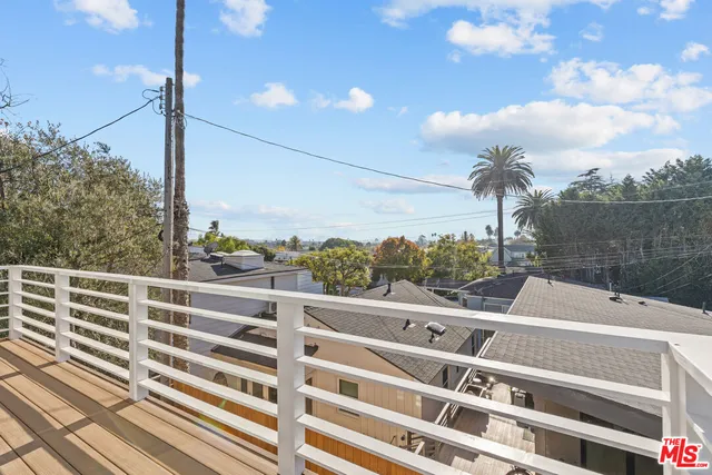 a view of a balcony with city view