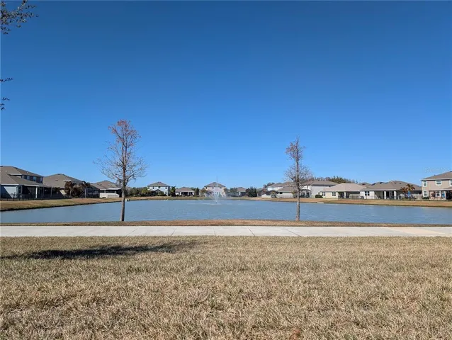 a view of a patio with a table and chairs