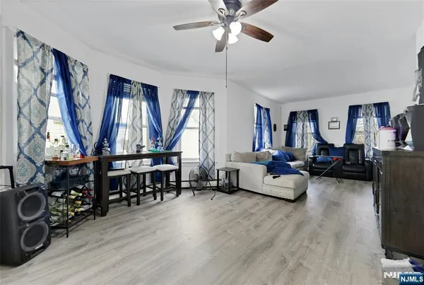 a living room with furniture and a window