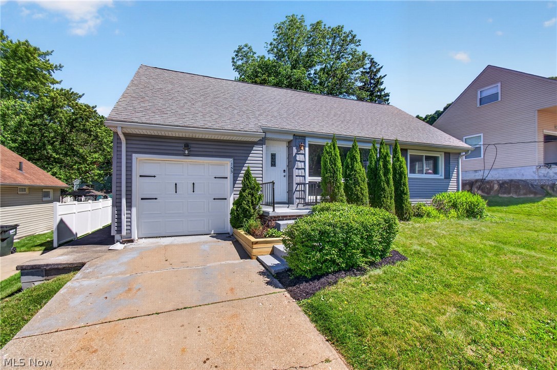 153 Far View Road Southwest North Canton, OH 44720 - Photo 2 of 30 Attached garage with cement driveway