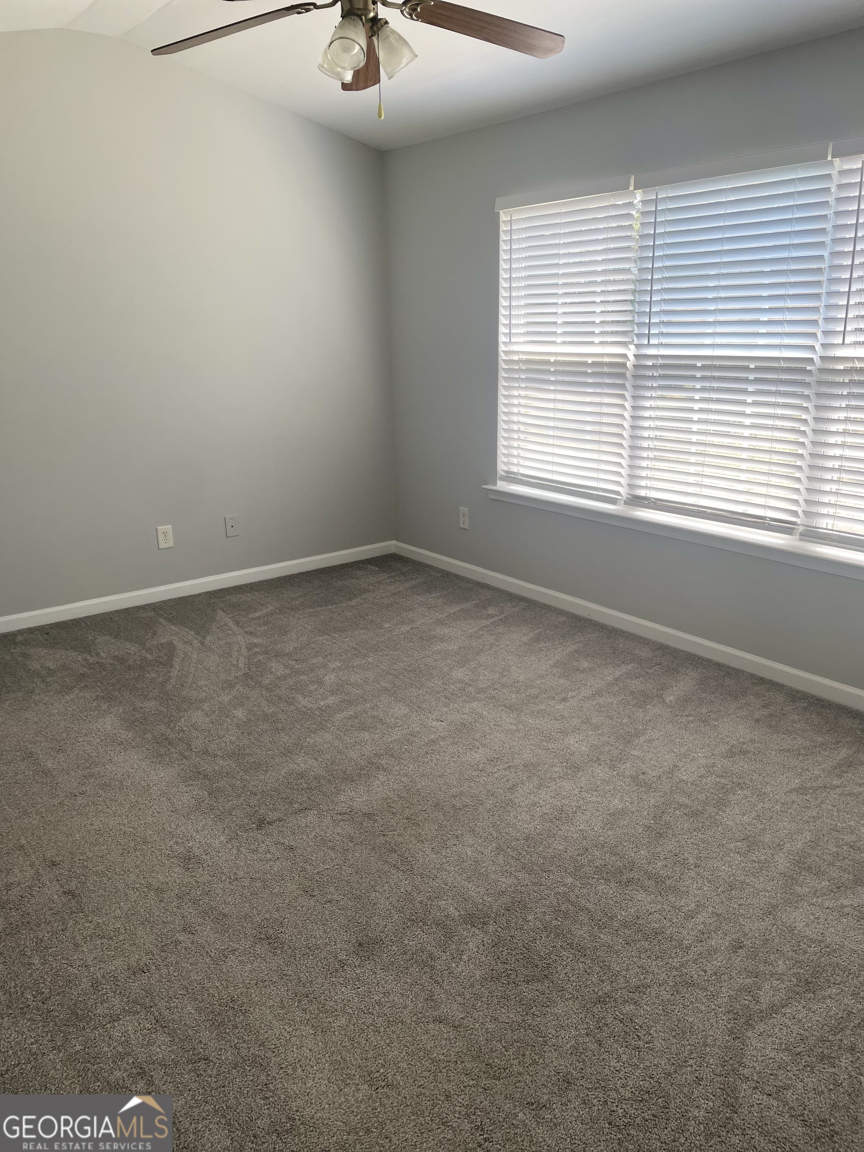 3640 Utoy Drive Southwest South Fulton, GA 30331 - Photo 19 of 26 an empty room with a window