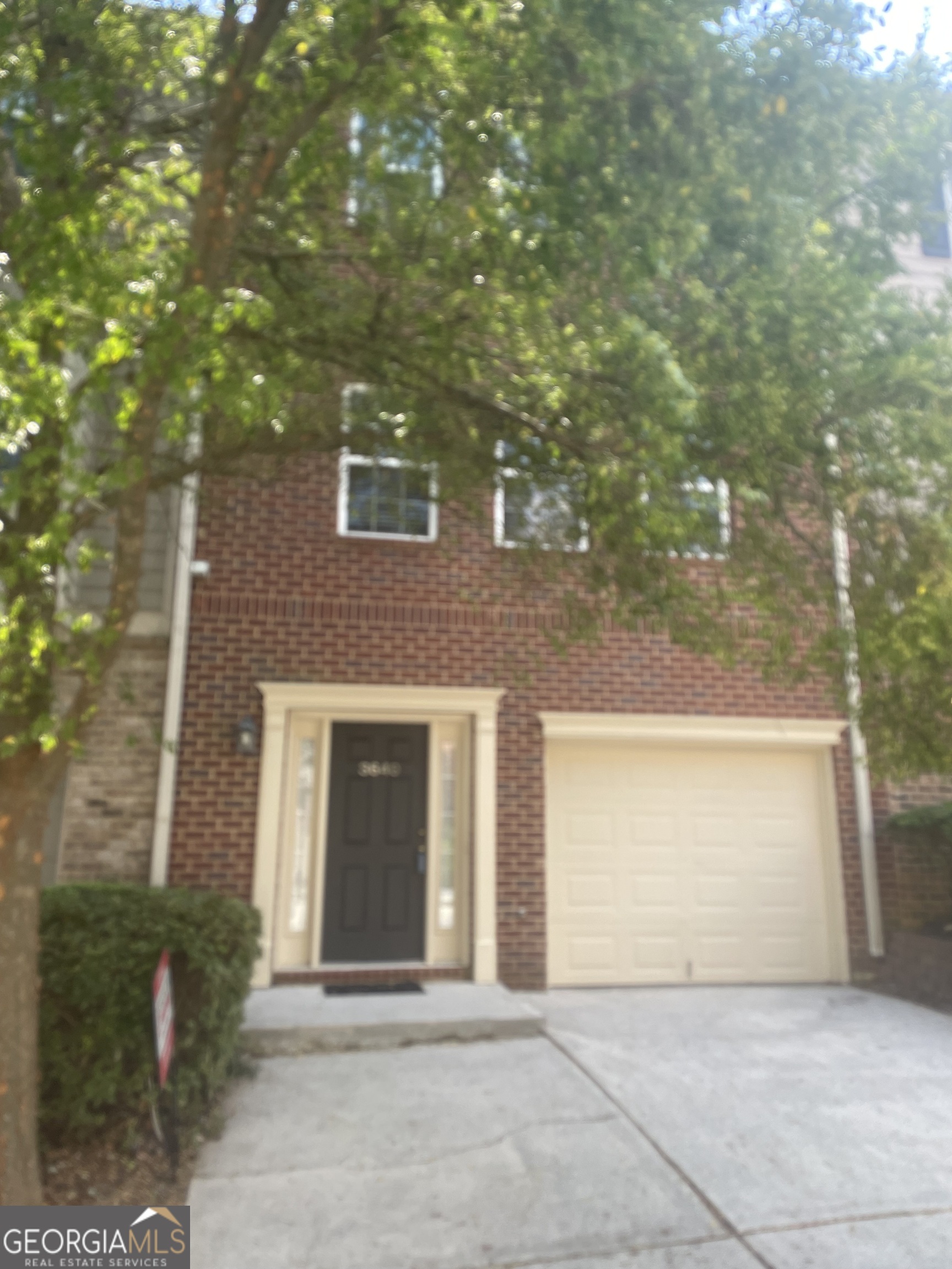 3640 Utoy Drive Southwest South Fulton, GA 30331 - Photo 3 of 26 a front view of a house with a yard