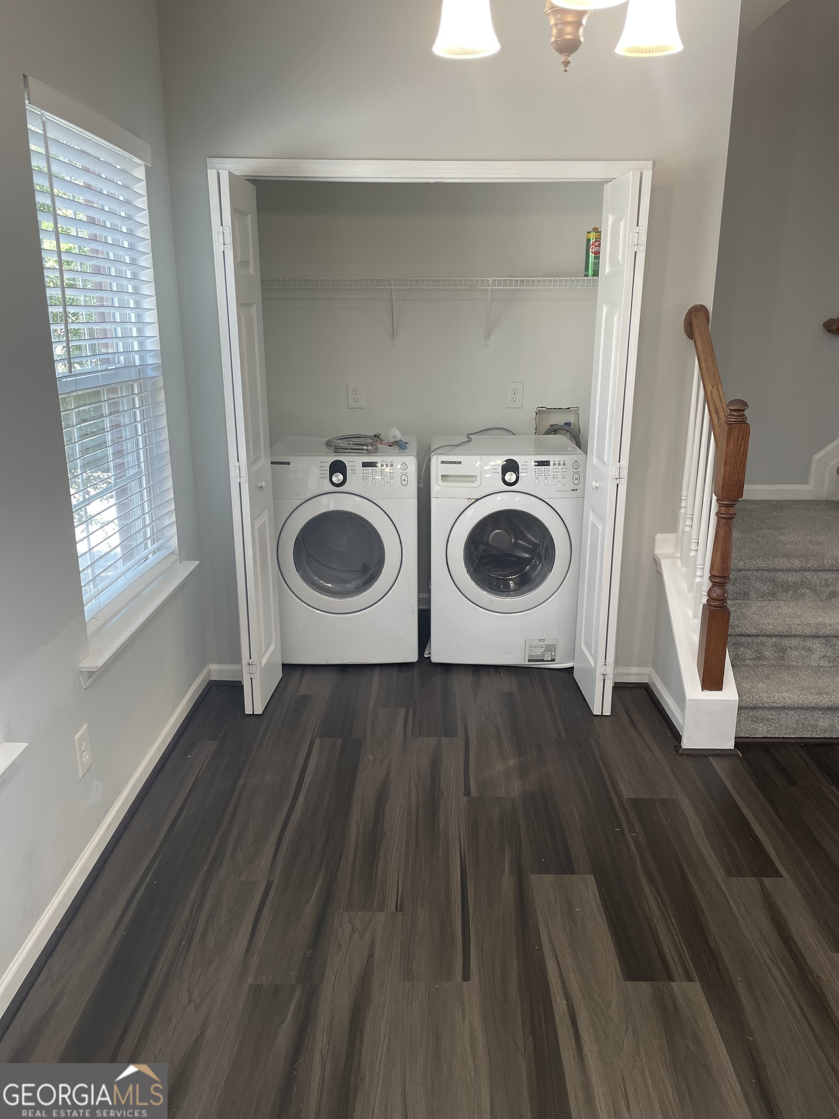 3640 Utoy Drive Southwest South Fulton, GA 30331 - Photo 10 of 26 a view of a storage and utility room with wooden floor washer and dryer