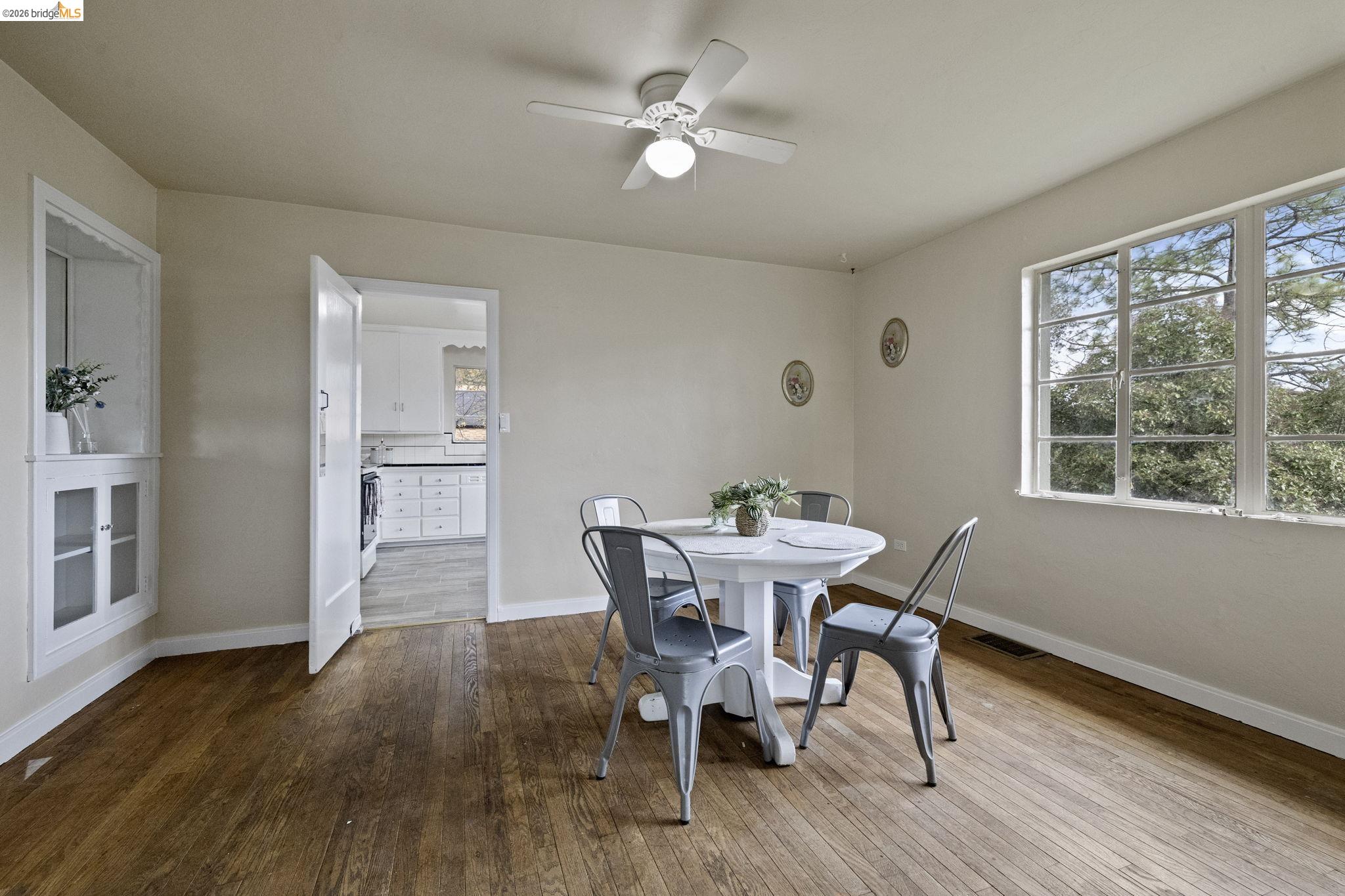 299 Summit Avenue Sonora, CA 95370 - Photo 14 of 38 Dining area with light wood-style floors, ceiling fan, and healthy amount of natural light