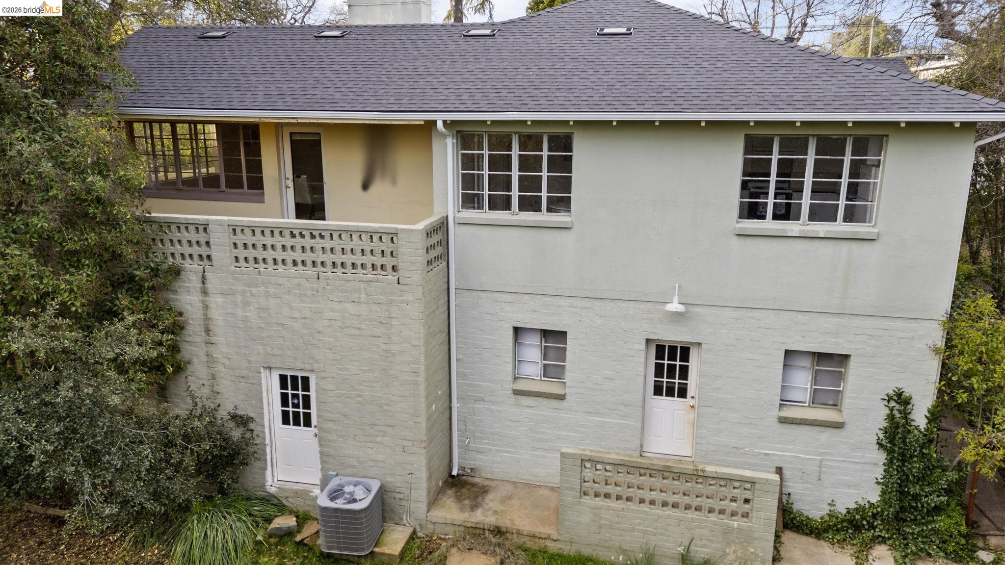 299 Summit Avenue Sonora, CA 95370 - Photo 33 of 38 Rear view of property with stucco siding, a chimney, and a balcony