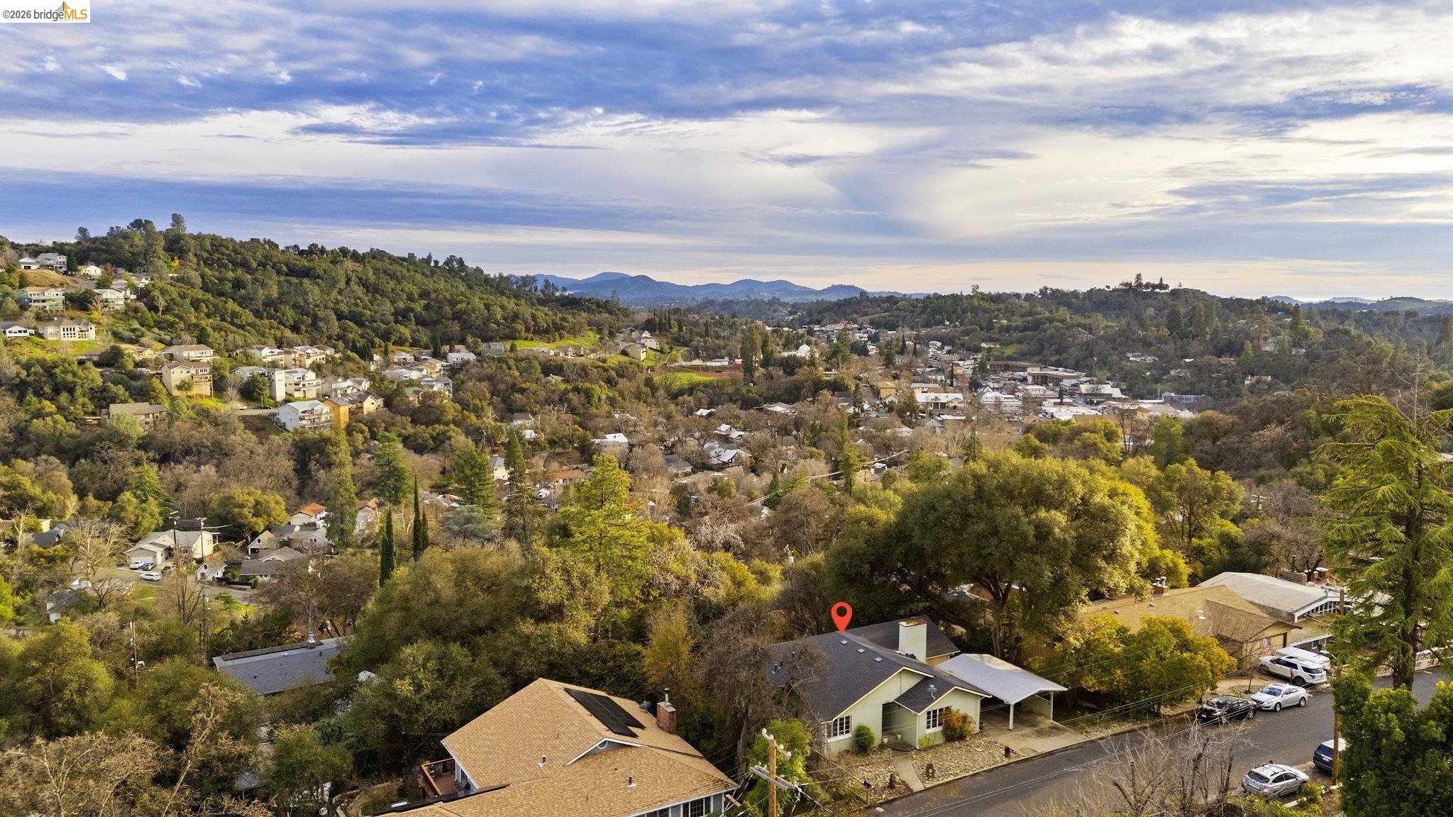 299 Summit Avenue Sonora, CA 95370 - Photo 36 of 38 Aerial view of property's location with nearby suburban area and mountains