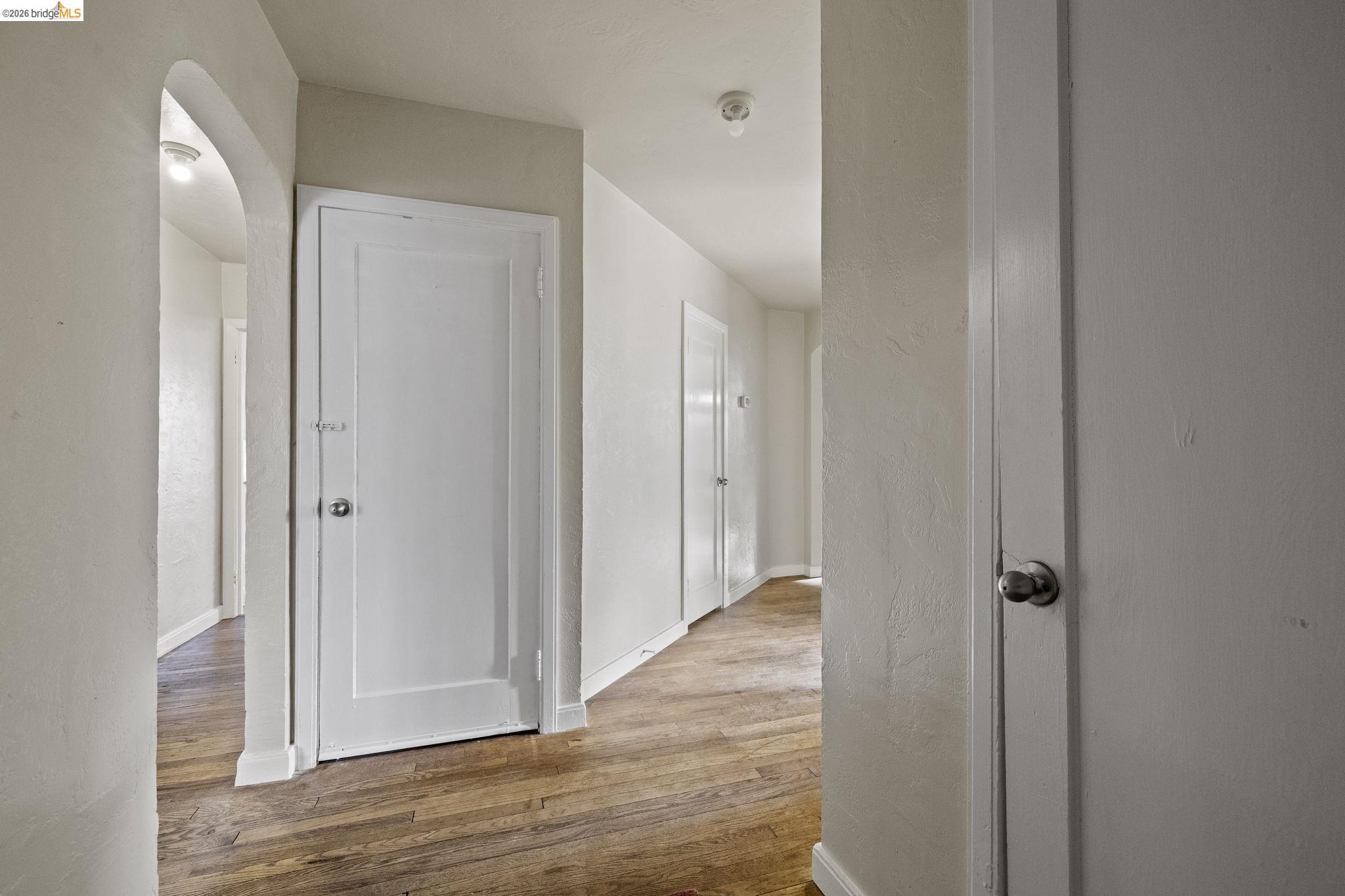 299 Summit Avenue Sonora, CA 95370 - Photo 4 of 38 Corridor with wood finished floors and baseboards
