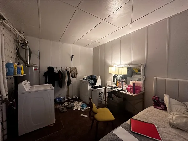 a view of a workspace with furniture
