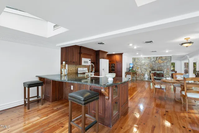 a bed room with furniture and wooden floor
