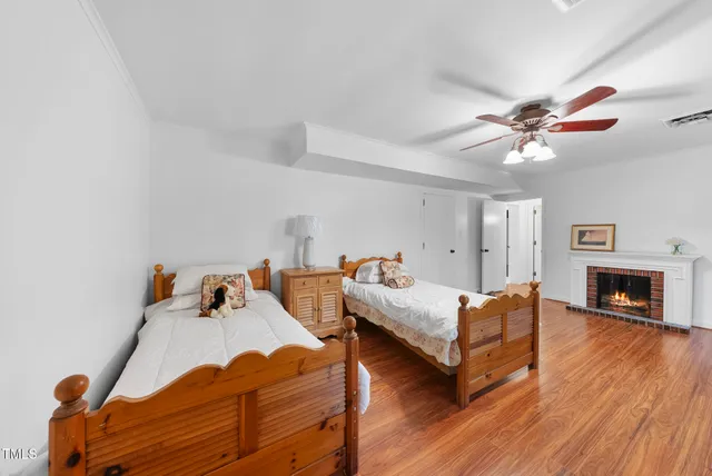 a view of a house with backyard sitting area and garden