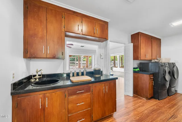 a view of a swimming pool with an outdoor space and seating area