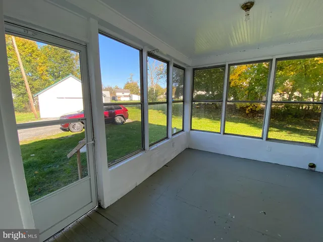 a view of an empty room with window