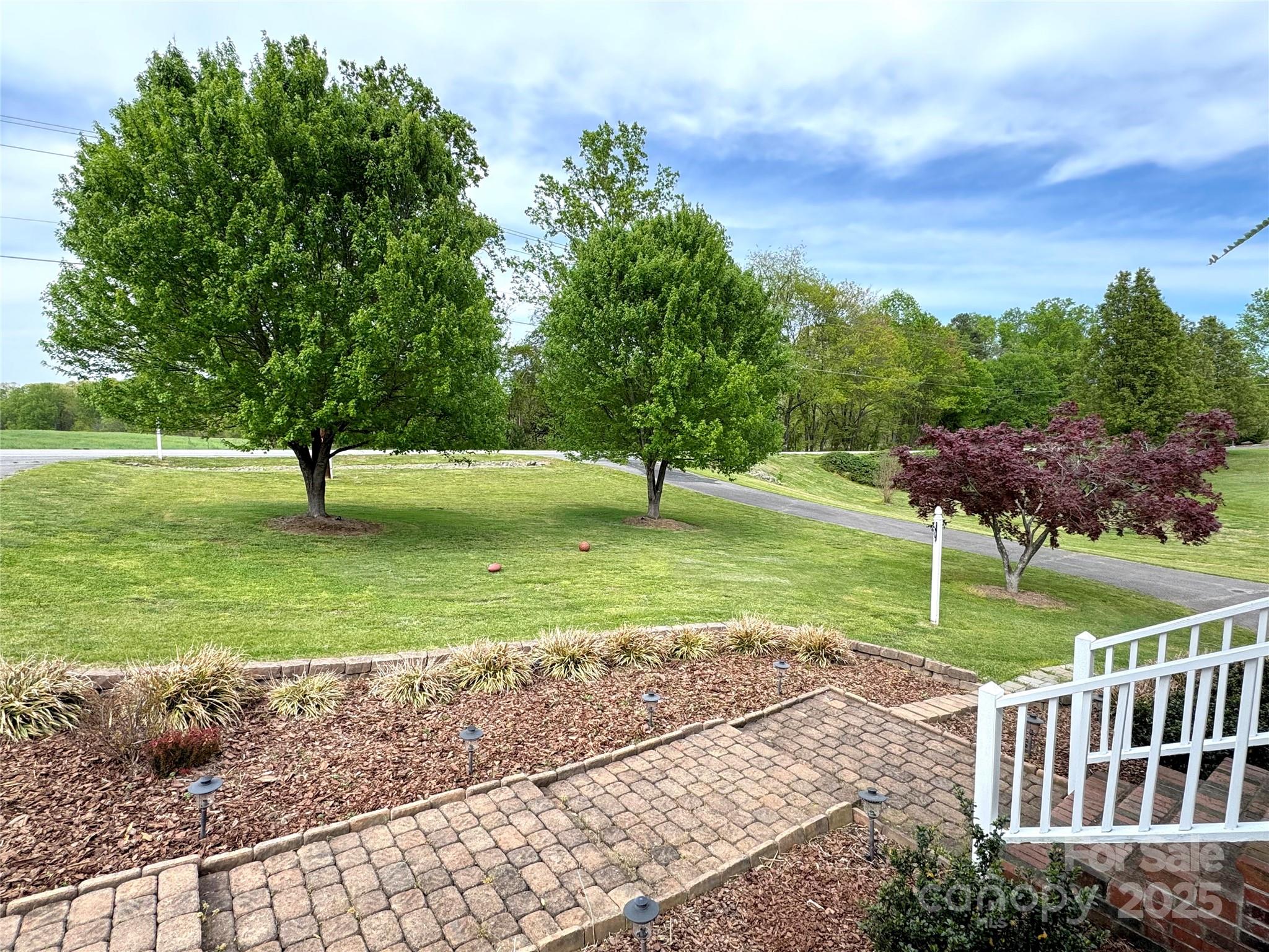 5006 Howell School Road Jonesville, NC 28642 - Photo 11 of 47 a view of a garden with an outdoor space