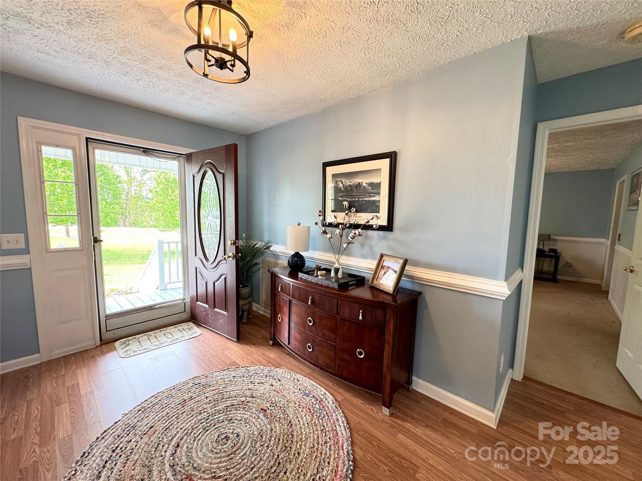 5006 Howell School Road Jonesville, NC 28642 - Photo 13 of 47 a bedroom with furniture and a window