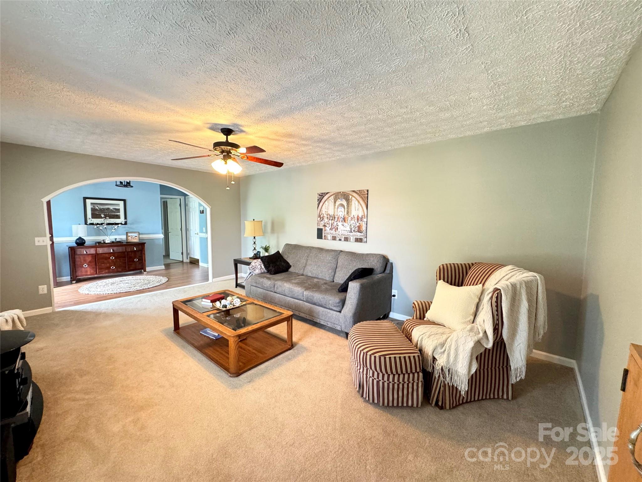 5006 Howell School Road Jonesville, NC 28642 - Photo 15 of 47 a living room with furniture