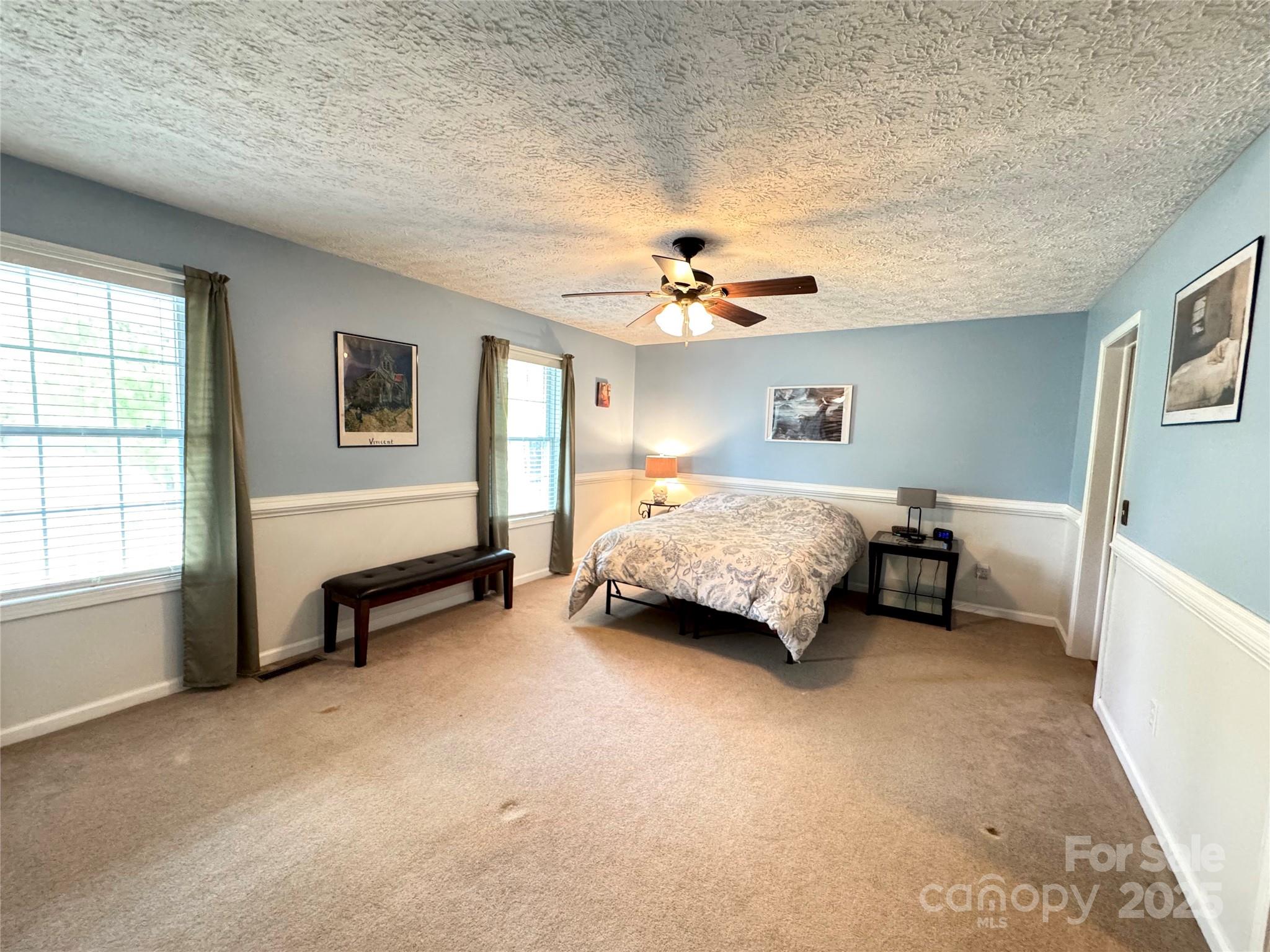 5006 Howell School Road Jonesville, NC 28642 - Photo 17 of 47 a view of a bedroom with furniture and window