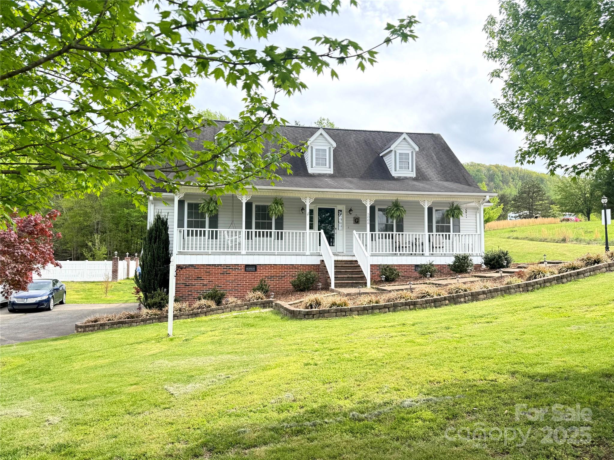 5006 Howell School Road Jonesville, NC 28642 - Photo 41 of 47 a view of a house with a swimming pool