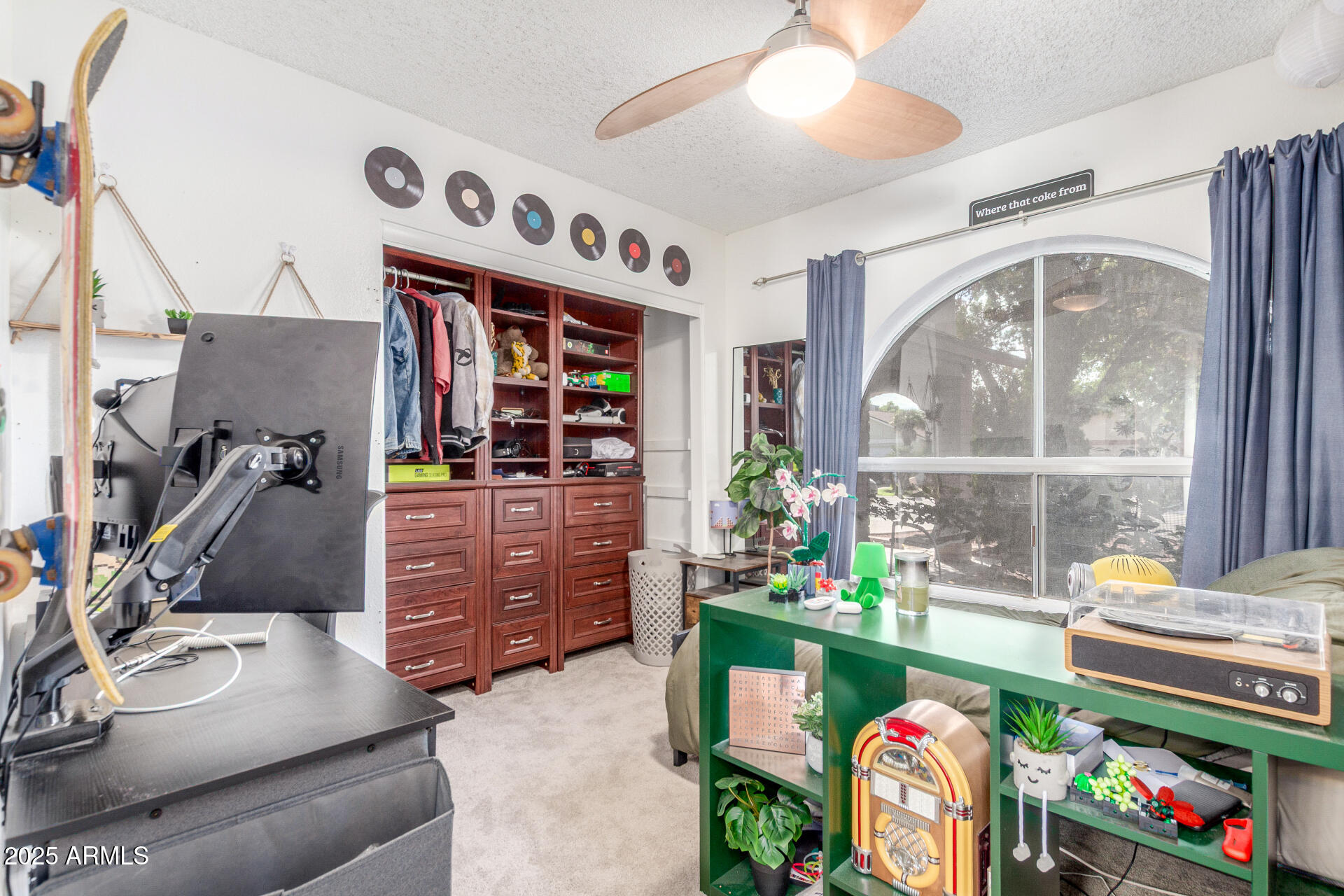 4732 West Davis Road Glendale, AZ 85306 - Photo 18 of 38 a living room with furniture and a window