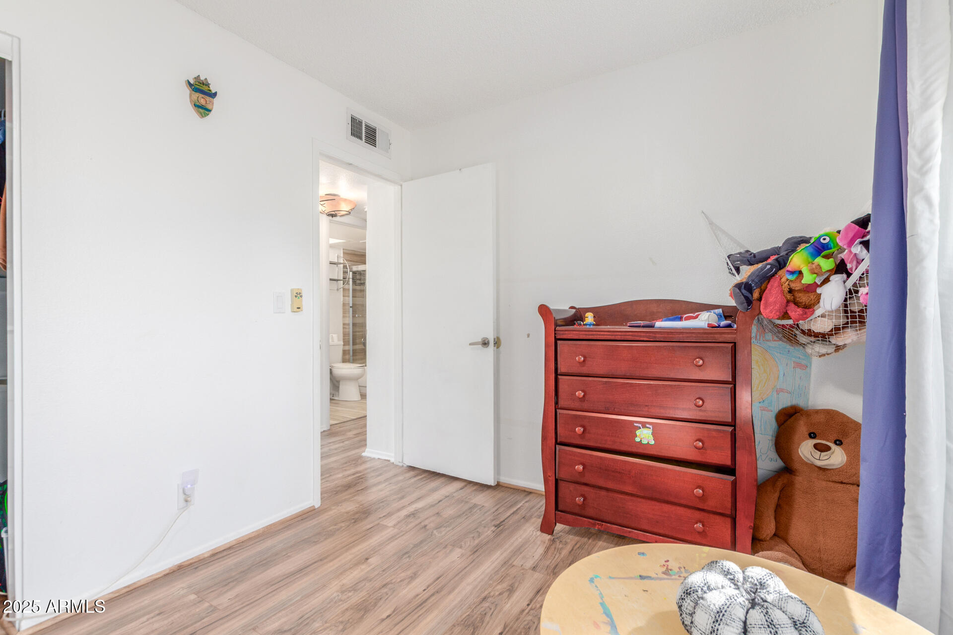 4732 West Davis Road Glendale, AZ 85306 - Photo 21 of 38 walk in closet with clothes and shoes