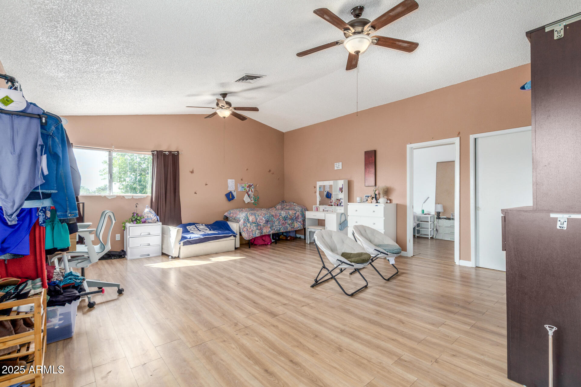 4732 West Davis Road Glendale, AZ 85306 - Photo 23 of 38 a view of a livingroom with workspace and a window