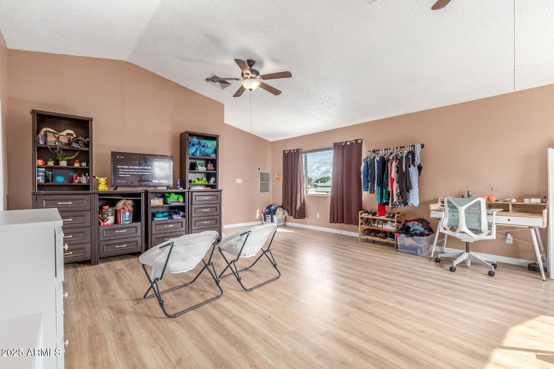 4732 West Davis Road Glendale, AZ 85306 - Photo 24 of 38 a view of a livingroom with furniture and a couch