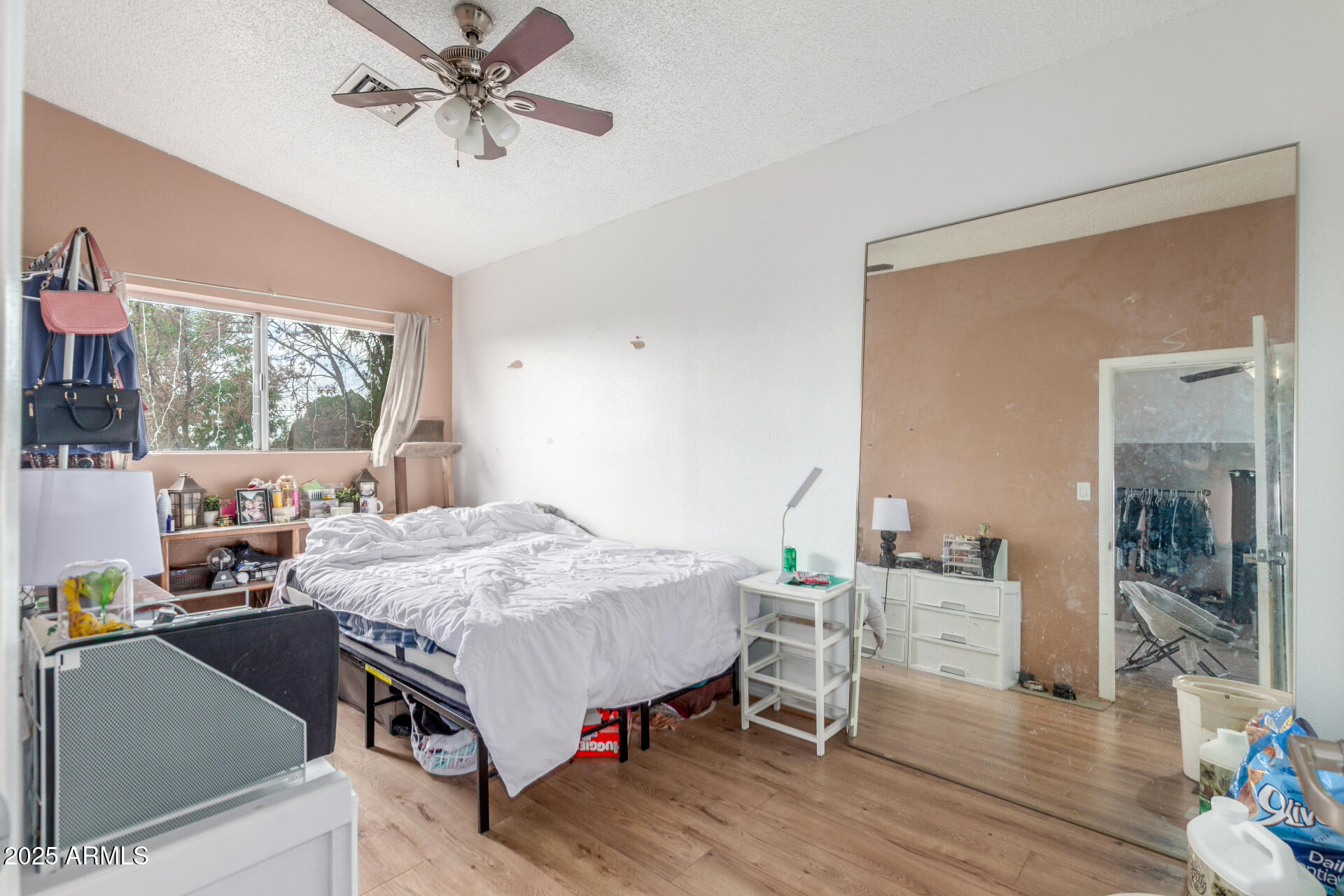 4732 West Davis Road Glendale, AZ 85306 - Photo 26 of 38 a bed room with a bed and a table