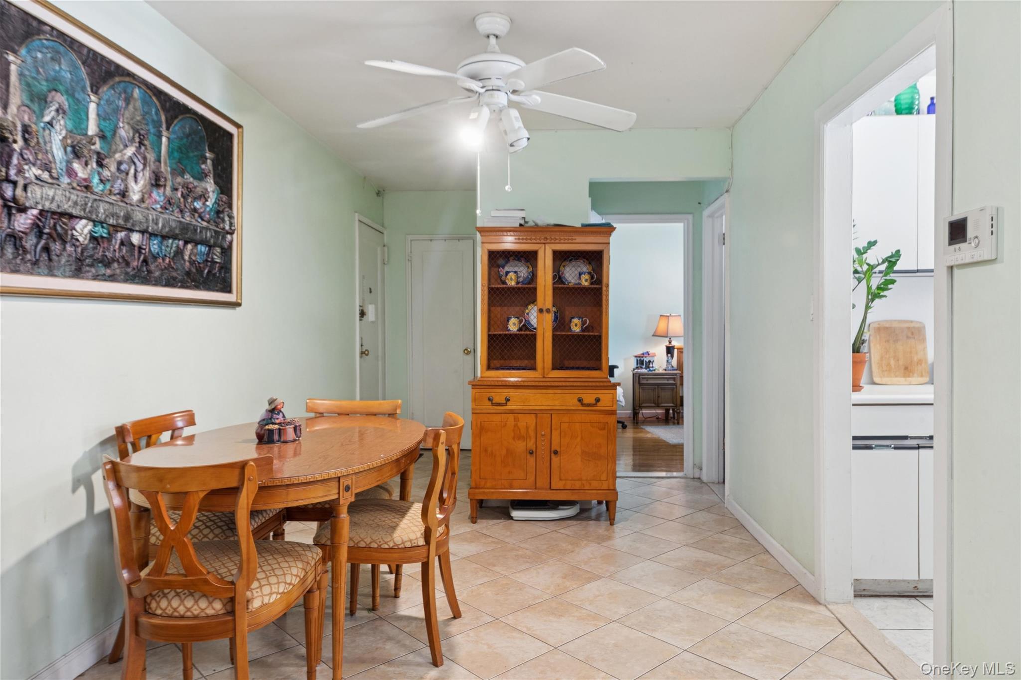 32-40 92nd Street, Unit 107 Queens, NY 11369 - Photo 8 of 16 a dining room with furniture and window