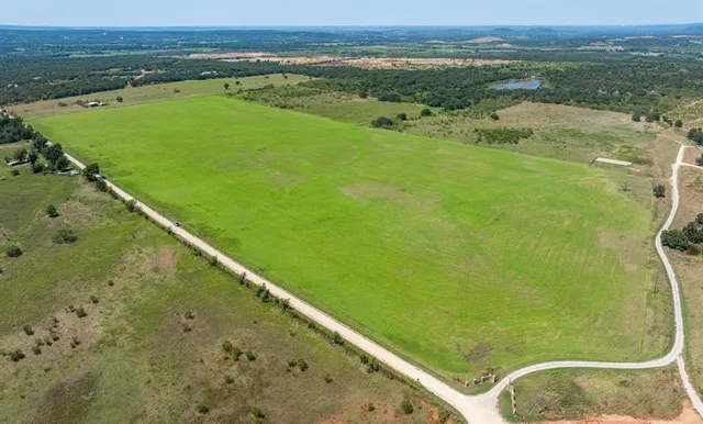 a view of a balcony with an ocean