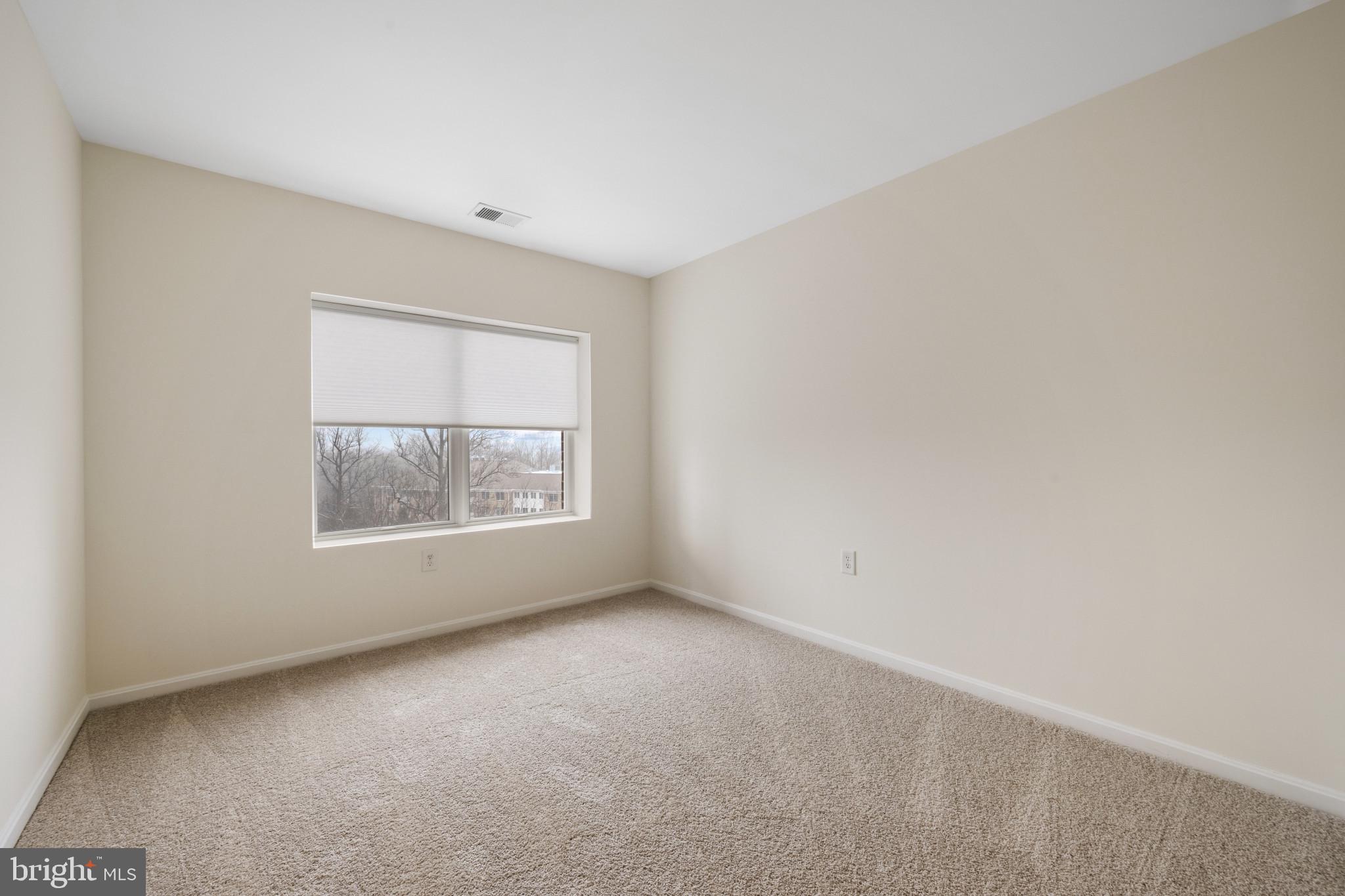 12246 Roundwood Road, Unit 707 Lutherville-Timonium, MD 21093 - Photo 19 of 24 Den