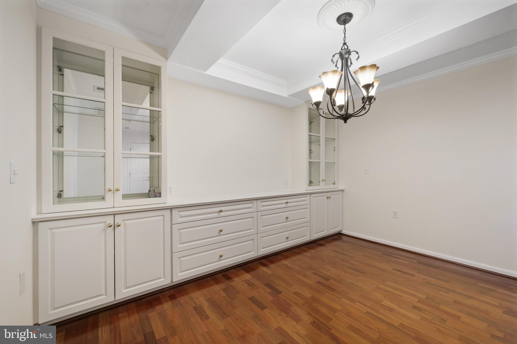 12246 Roundwood Road, Unit 707 Lutherville-Timonium, MD 21093 - Photo 4 of 24 Dining room with built-in cabinetry
