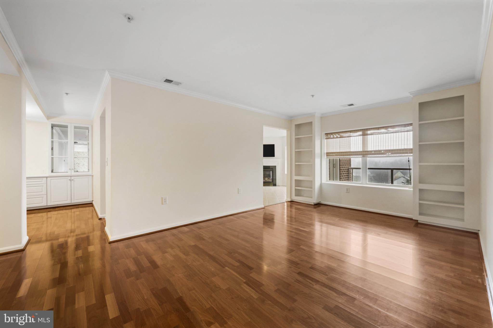 12246 Roundwood Road, Unit 707 Lutherville-Timonium, MD 21093 - Photo 6 of 24 large living room. Note bookcases