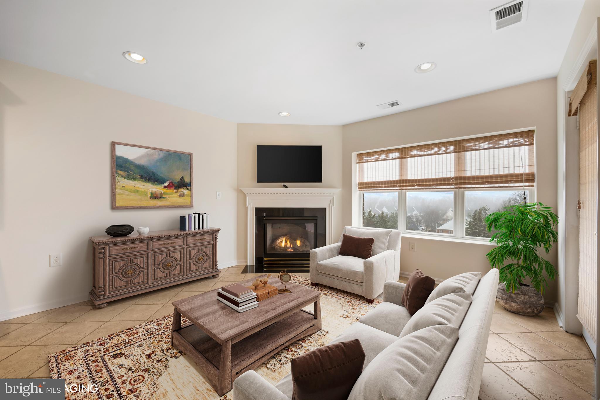 12246 Roundwood Road, Unit 707 Lutherville-Timonium, MD 21093 - Photo 7 of 24 Virtual staged family room