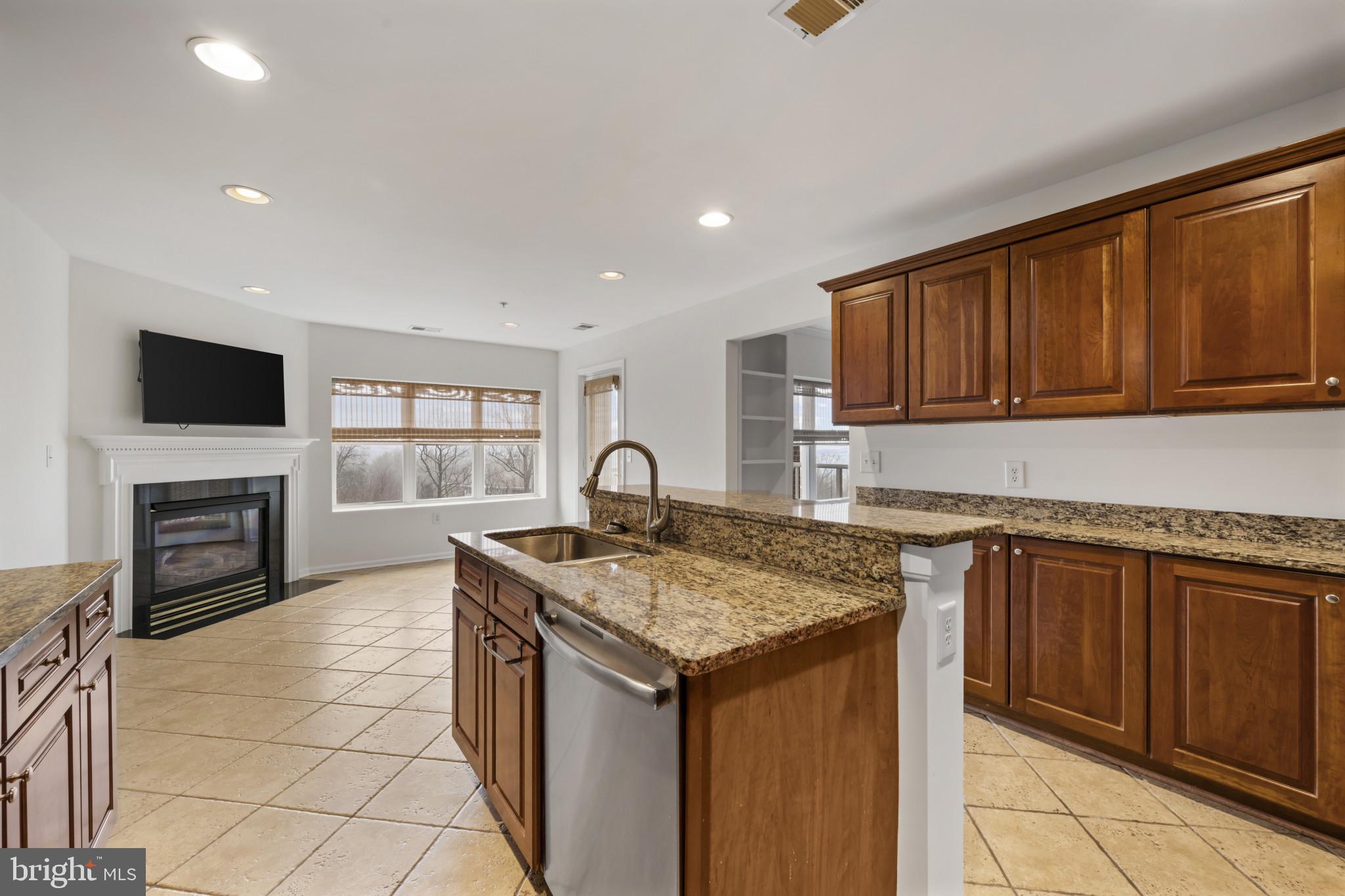 12246 Roundwood Road, Unit 707 Lutherville-Timonium, MD 21093 - Photo 10 of 24 Ceramic tile floor and lots of cabinets