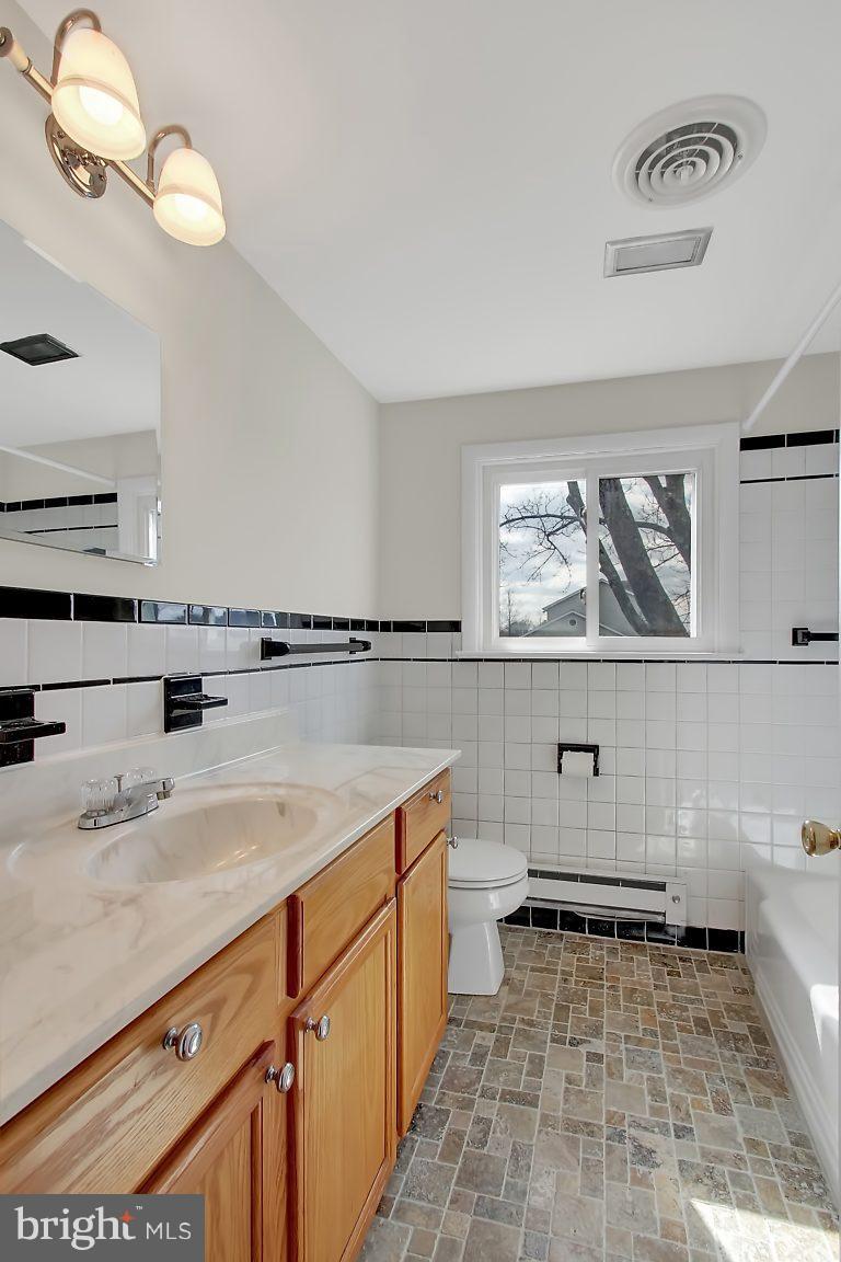 1900 White Hall Road White Hall, MD 21161 - Photo 14 of 21 Hall bath with ceramic tile floor