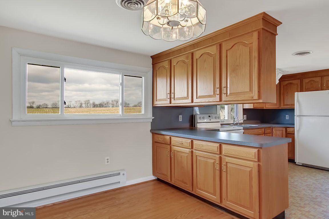 1900 White Hall Road White Hall, MD 21161 - Photo 5 of 21 Dining area adjacent to kitchen for easy serving