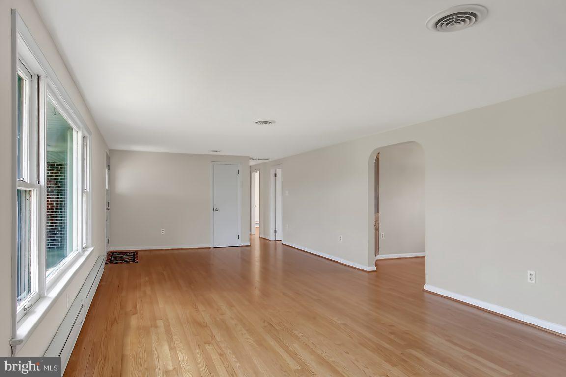 1900 White Hall Road White Hall, MD 21161 - Photo 7 of 21 Spacious living room with beautiful hardwood floor