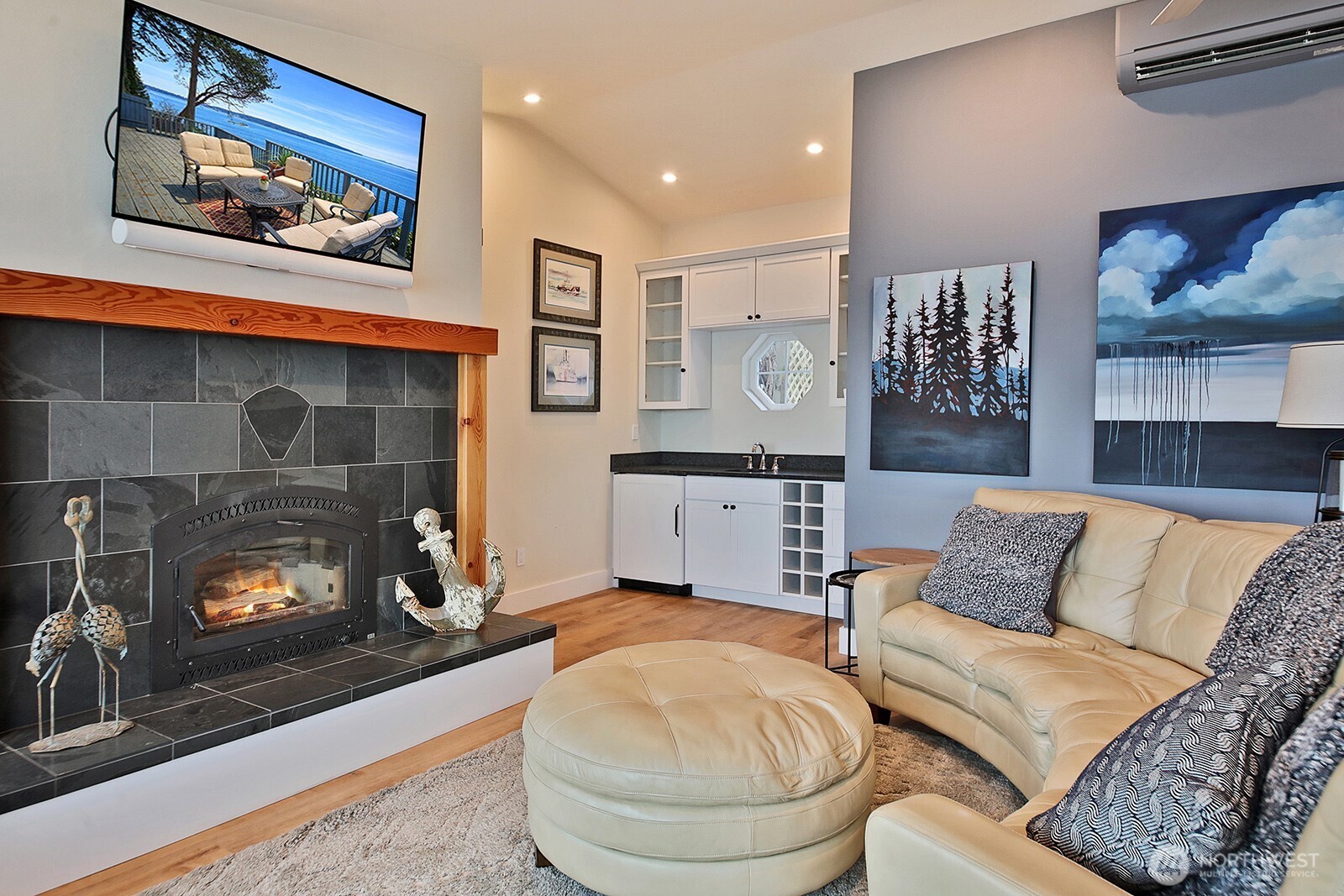 2999 Saratoga Road Langley, WA 98260 - Photo 14 of 40 a living room with furniture and a fireplace