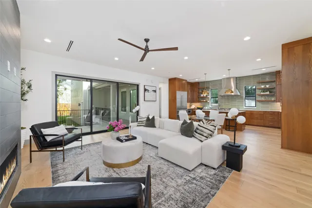 a living room with furniture and a table