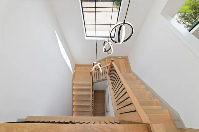 a view of stairs with wooden floor