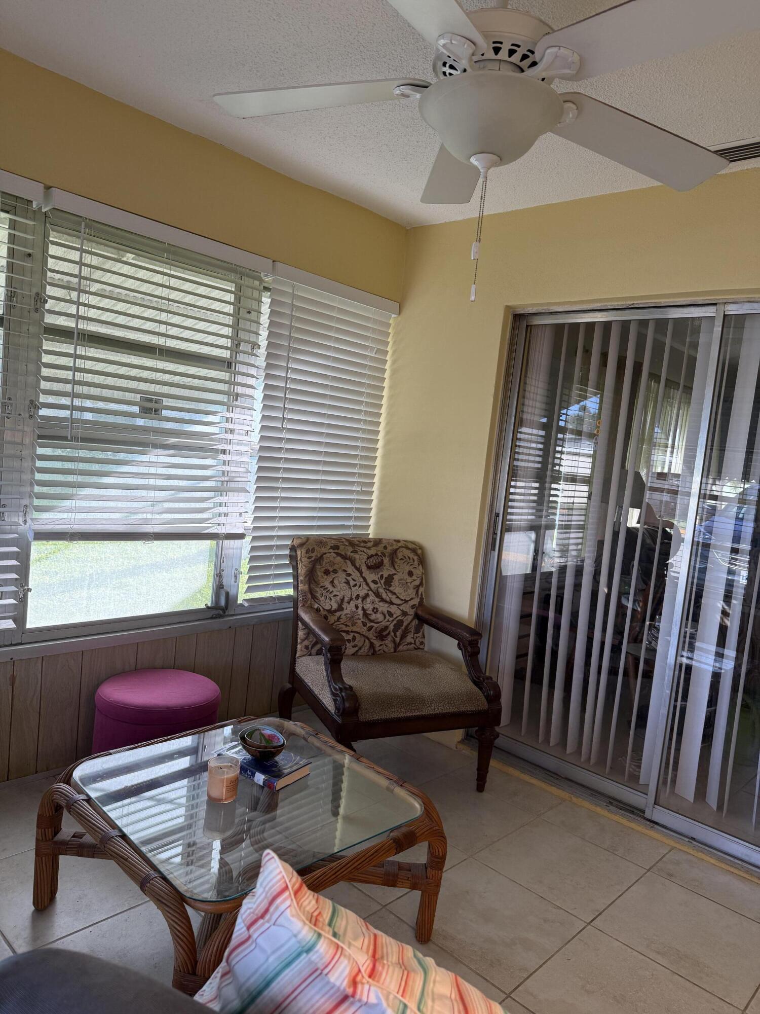 3311 Valley Road, Unit D Boynton Beach, FL 33435 - Photo 11 of 26 a living room with furniture and a window