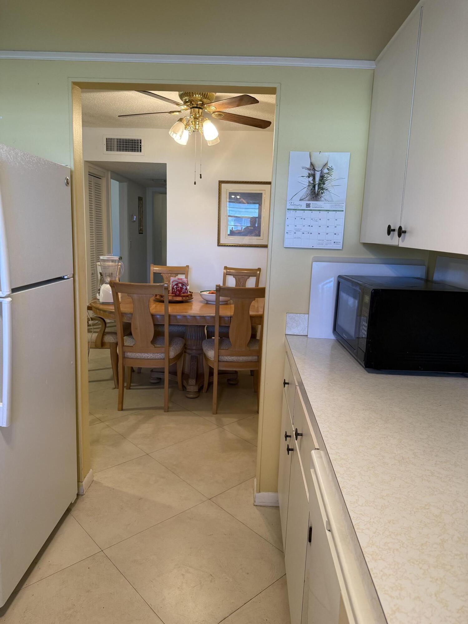 3311 Valley Road, Unit D Boynton Beach, FL 33435 - Photo 15 of 26 a view of a hallway with seating area