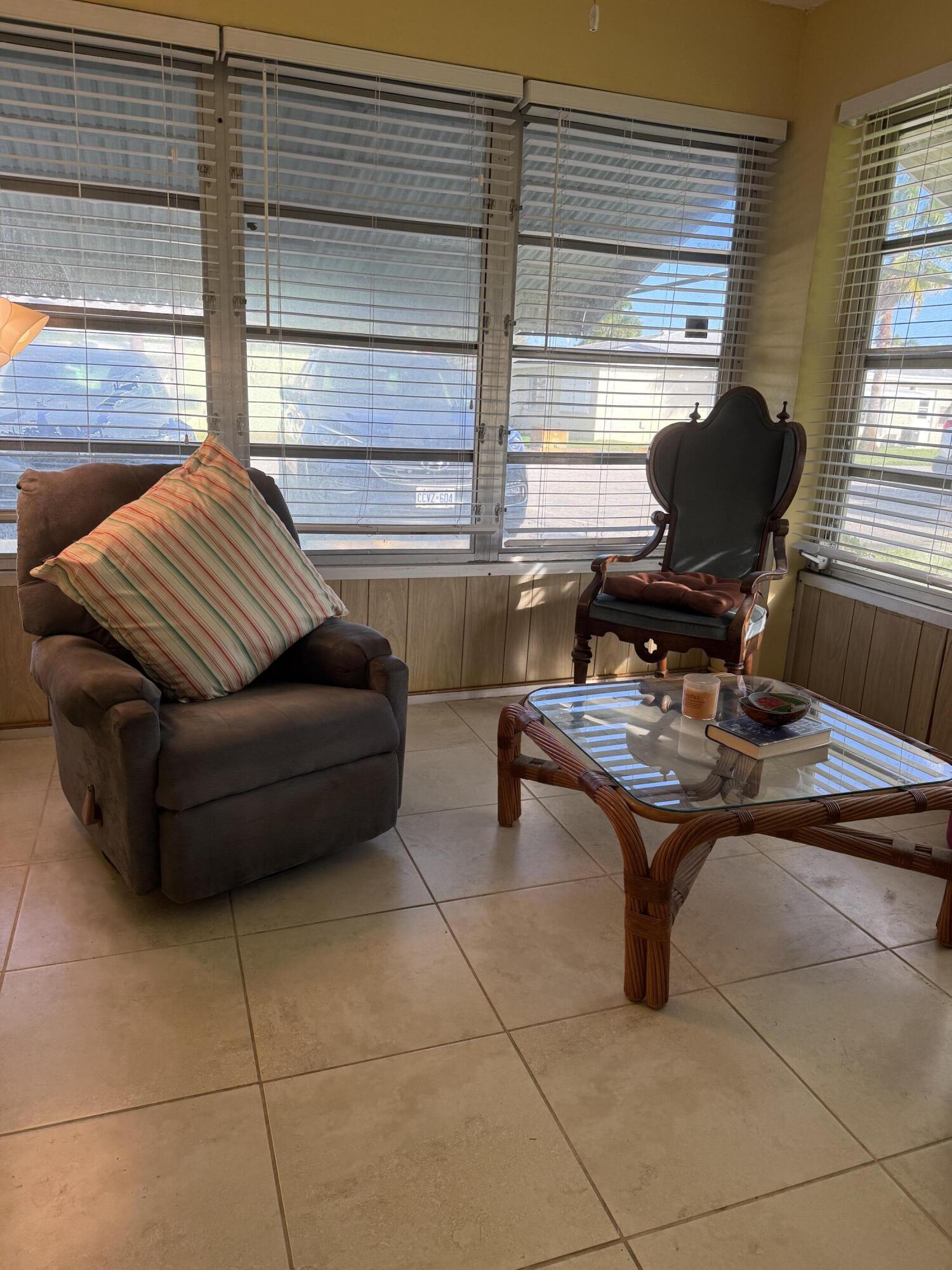 3311 Valley Road, Unit D Boynton Beach, FL 33435 - Photo 9 of 26 a living room with furniture and window