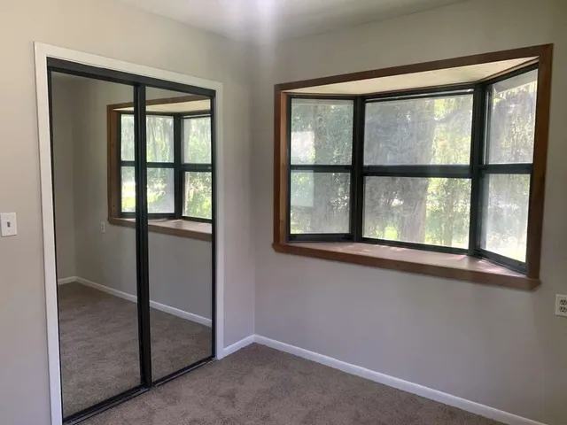 an empty room with windows