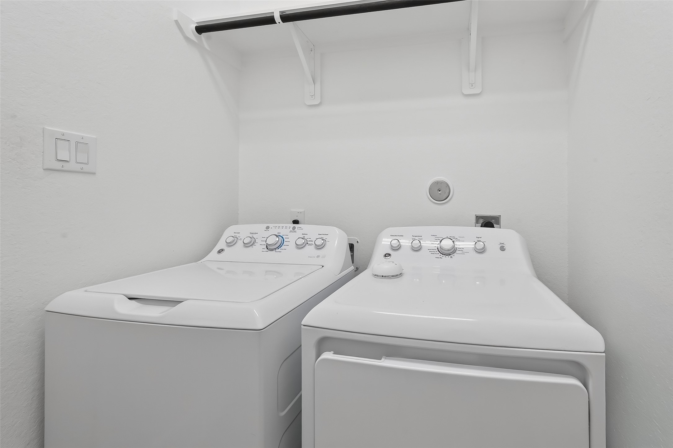 16226 Rattlesnake Run Trail Cypress, TX 77433 - Photo 15 of 29 a utility room with dryer and washer